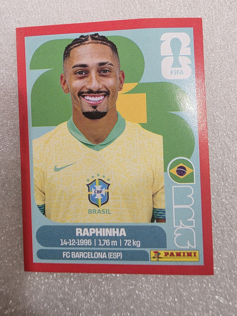 Panini Raphinha Brazil Sticker - Yellow & Green Jersey with Red Border